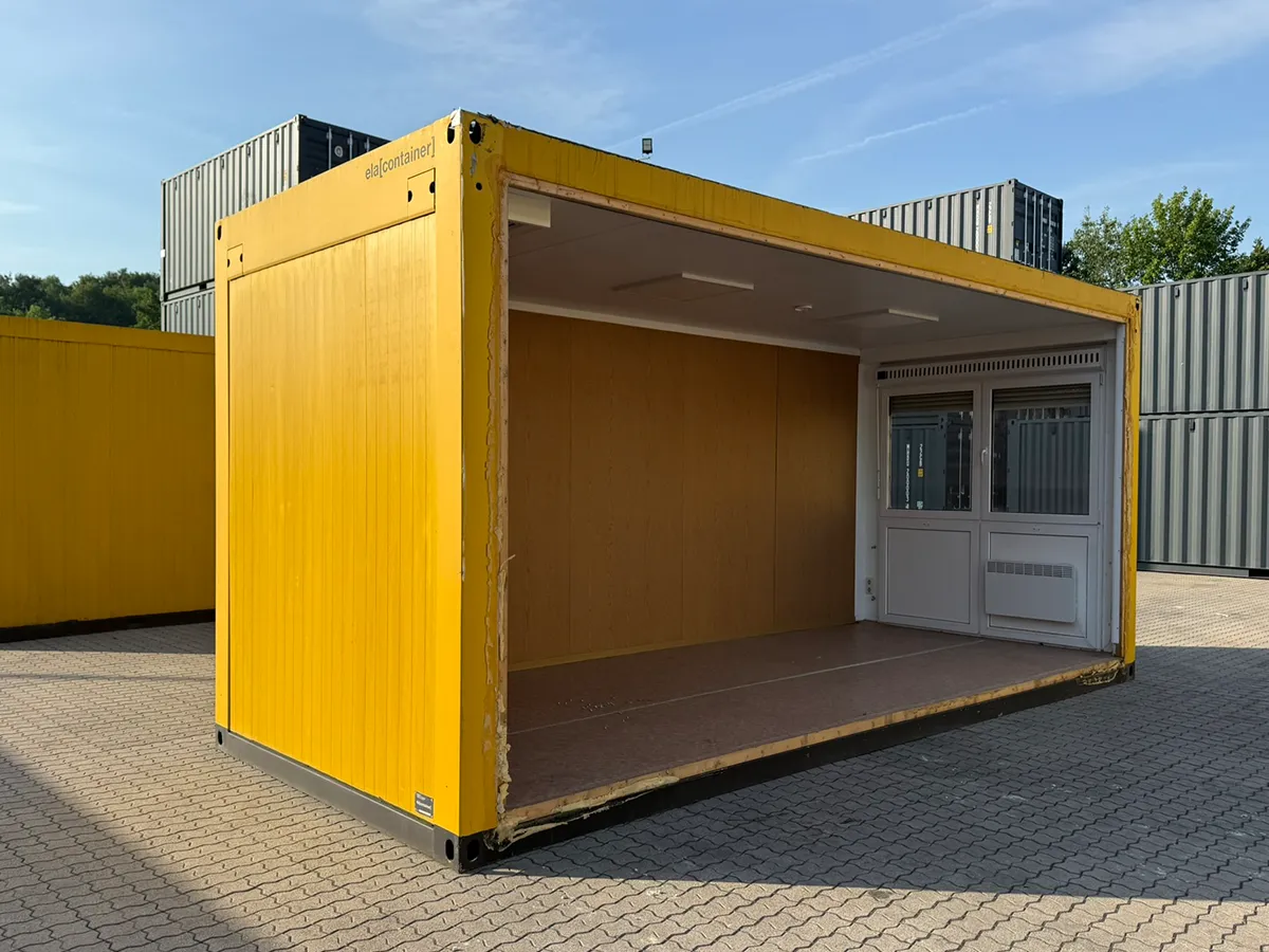 Gebrauchter Bürocontainer ELA Container gelb teiloffen mit Fensterfront, Seitenansicht