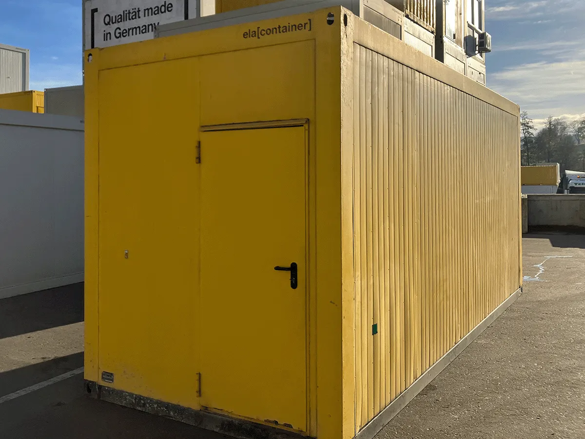 gebrauchter buerocontainer 20 fuss gelb mit eingangstuer aussenansicht modulcontainer