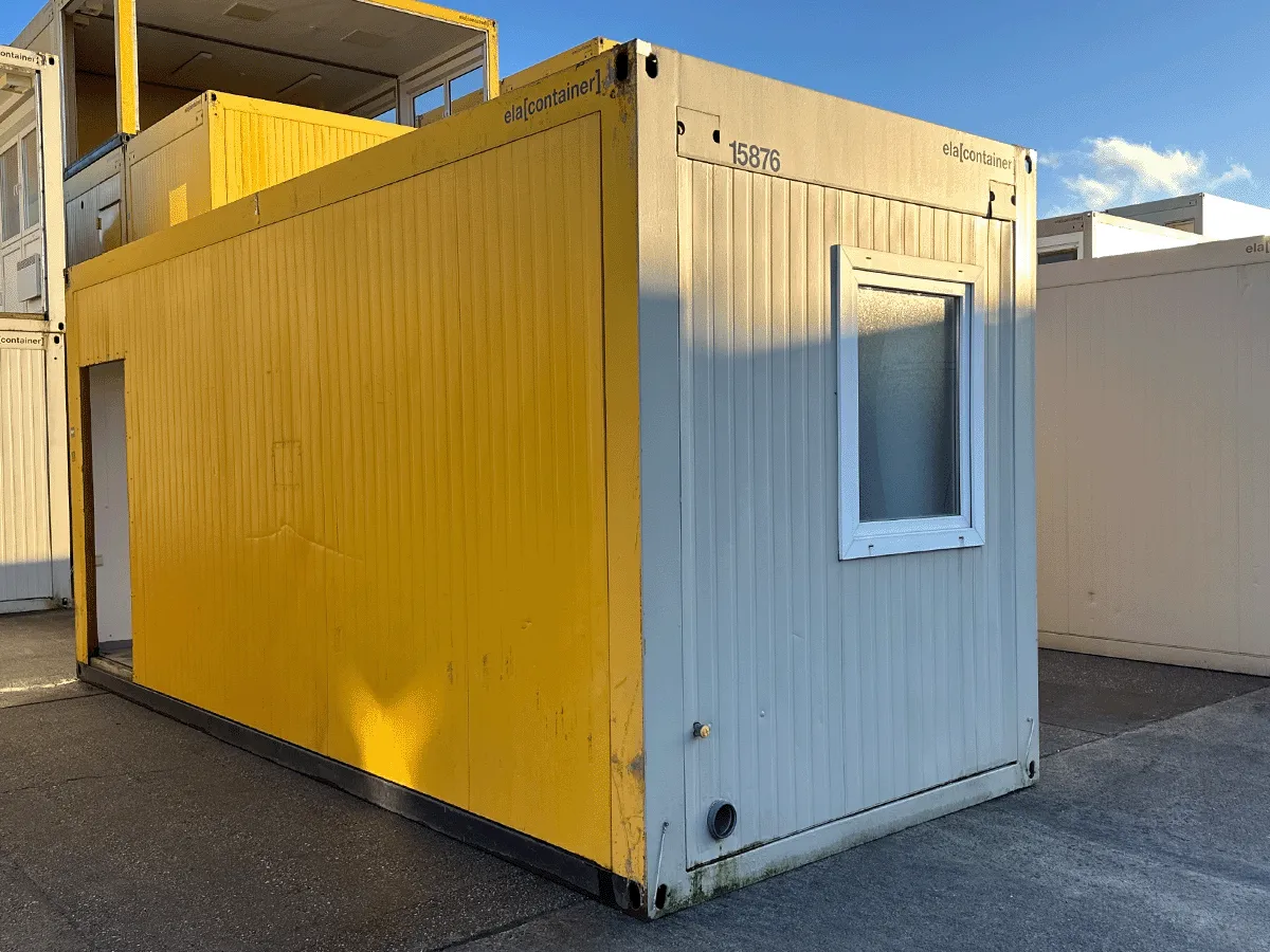 Sanitärcontainer außen gelb grau mit Fenster