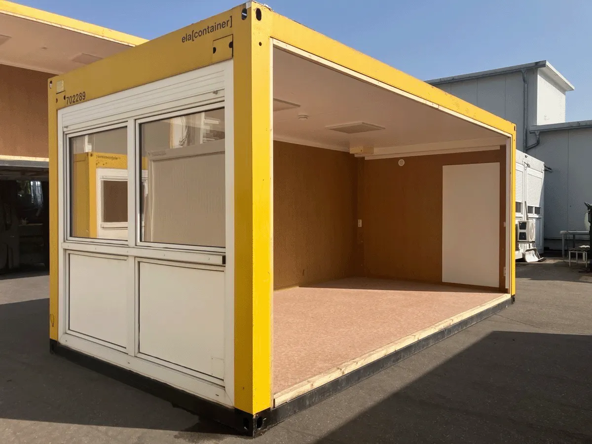 gebrauchter buerocontainer 20 fuss gelb mit offener seite und fensterfront aussenansicht
