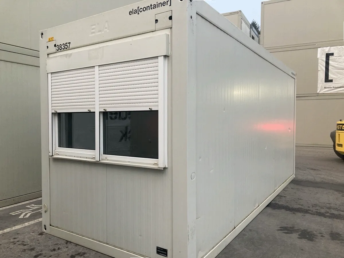 Gebrauchter Bürocontainer ELA Container grau mit Doppelfenster und Rolllade Außenansicht