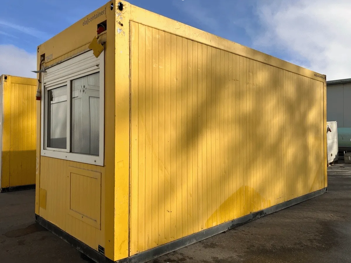 gebrauchter buerocontainer 20 fuss gelb mit fenster aussenansicht modulcontainer