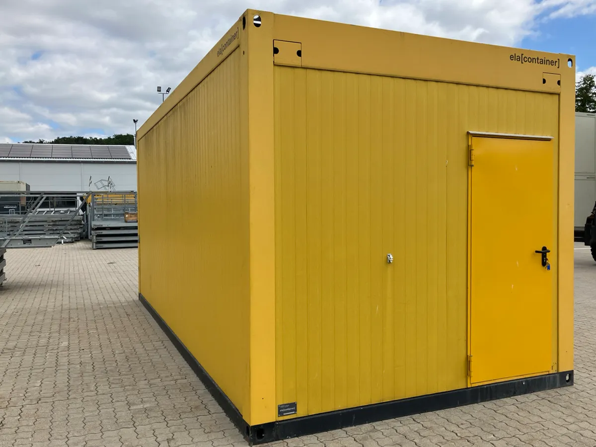 Gebrauchter Bürocontainer ELA Container gelb mit gelber Außentür, Außenansicht