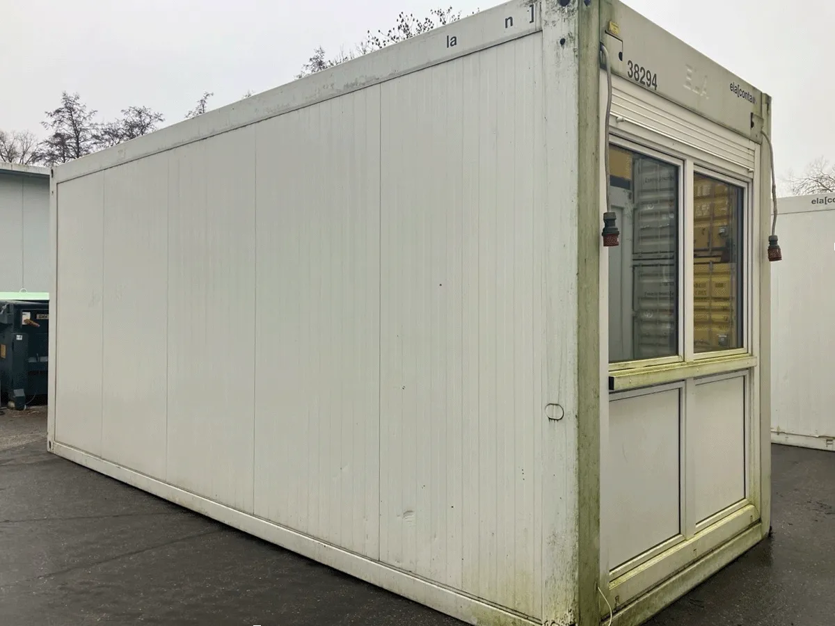 Gebrauchter Bürocontainer ELA Container grau mit Fenster und Rolllade Seitenansicht