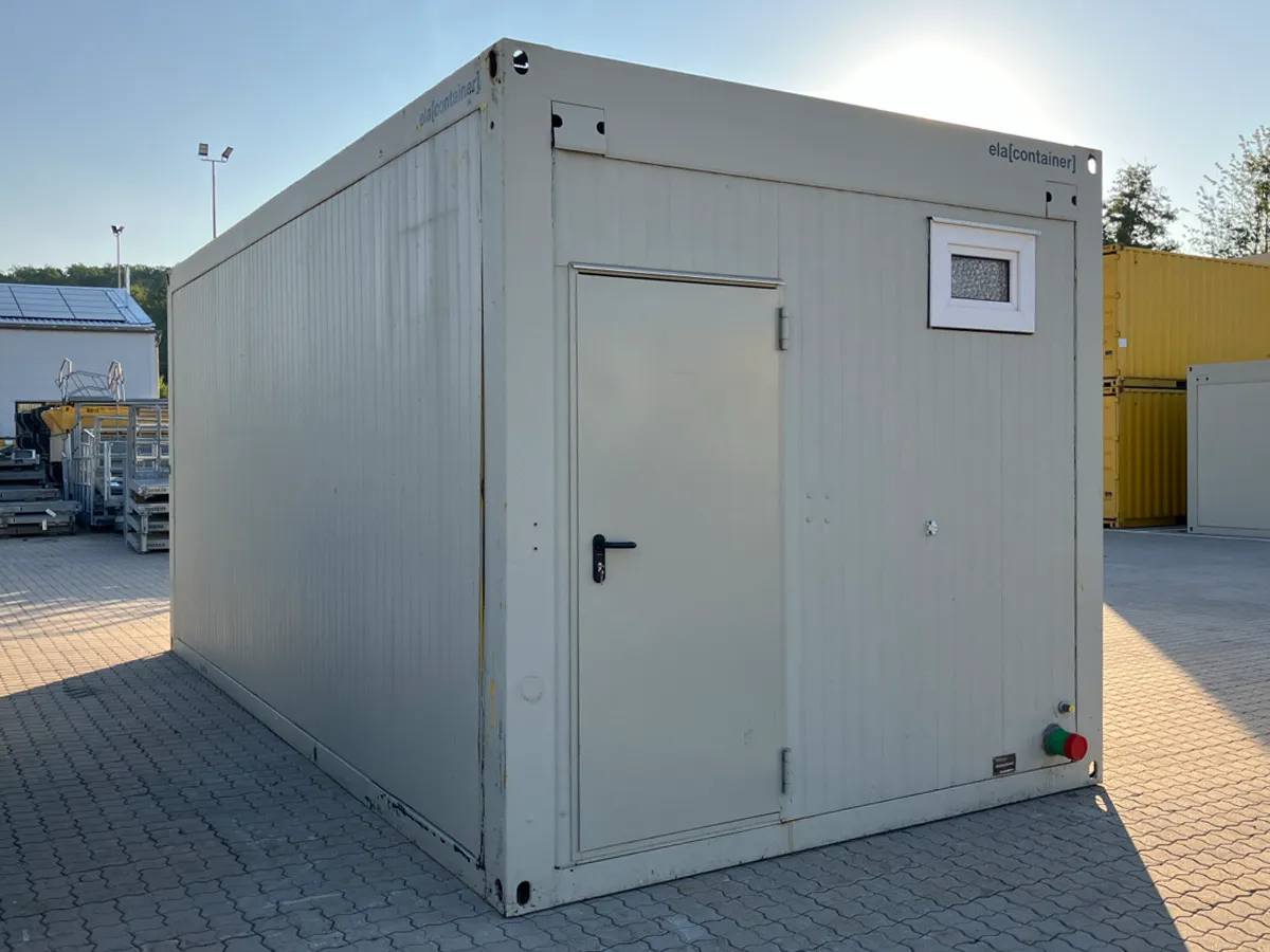 Gebrauchter Bürocontainer hellgrau mit Außentür und Fenster, Außenansicht