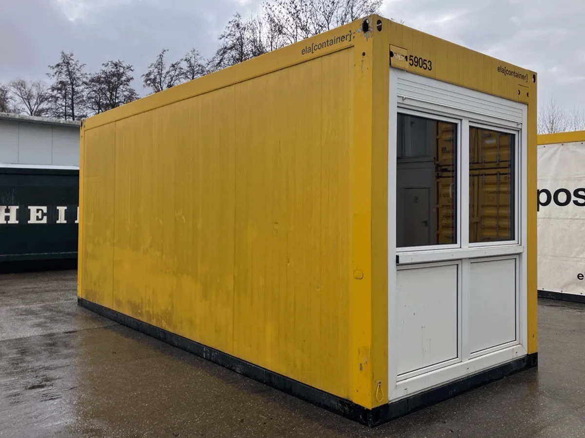 Gebrauchter Bürocontainer ELA Container gelb mit Fensterfront und Rolllade Seitenansicht