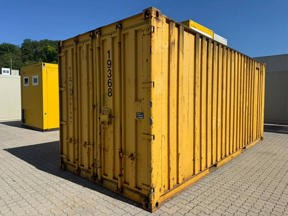 Gebrauchter Lagercontainer ELA Container gelb mit Zugangstür, Außenansicht