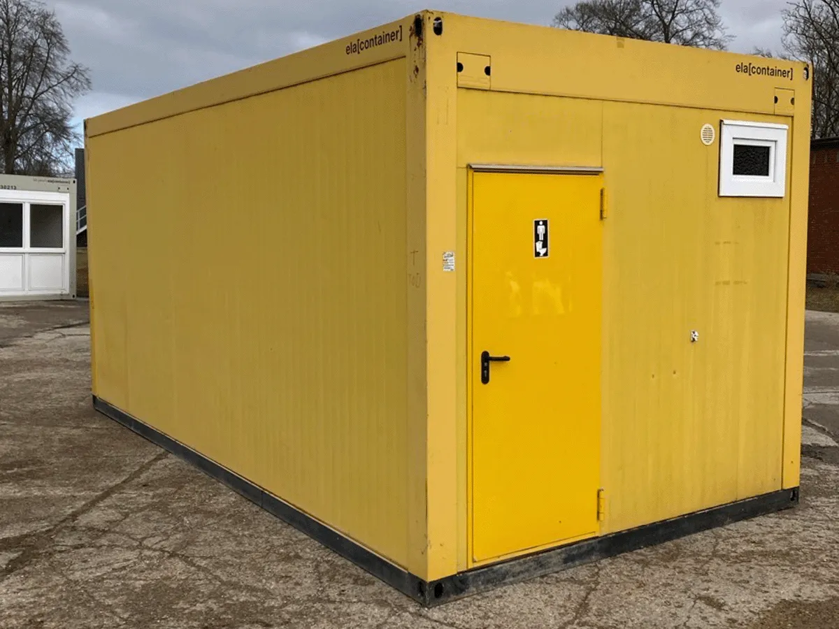 20 Fuß WC-Container goldgelb Außenansicht mit Tür auf Stirnseite