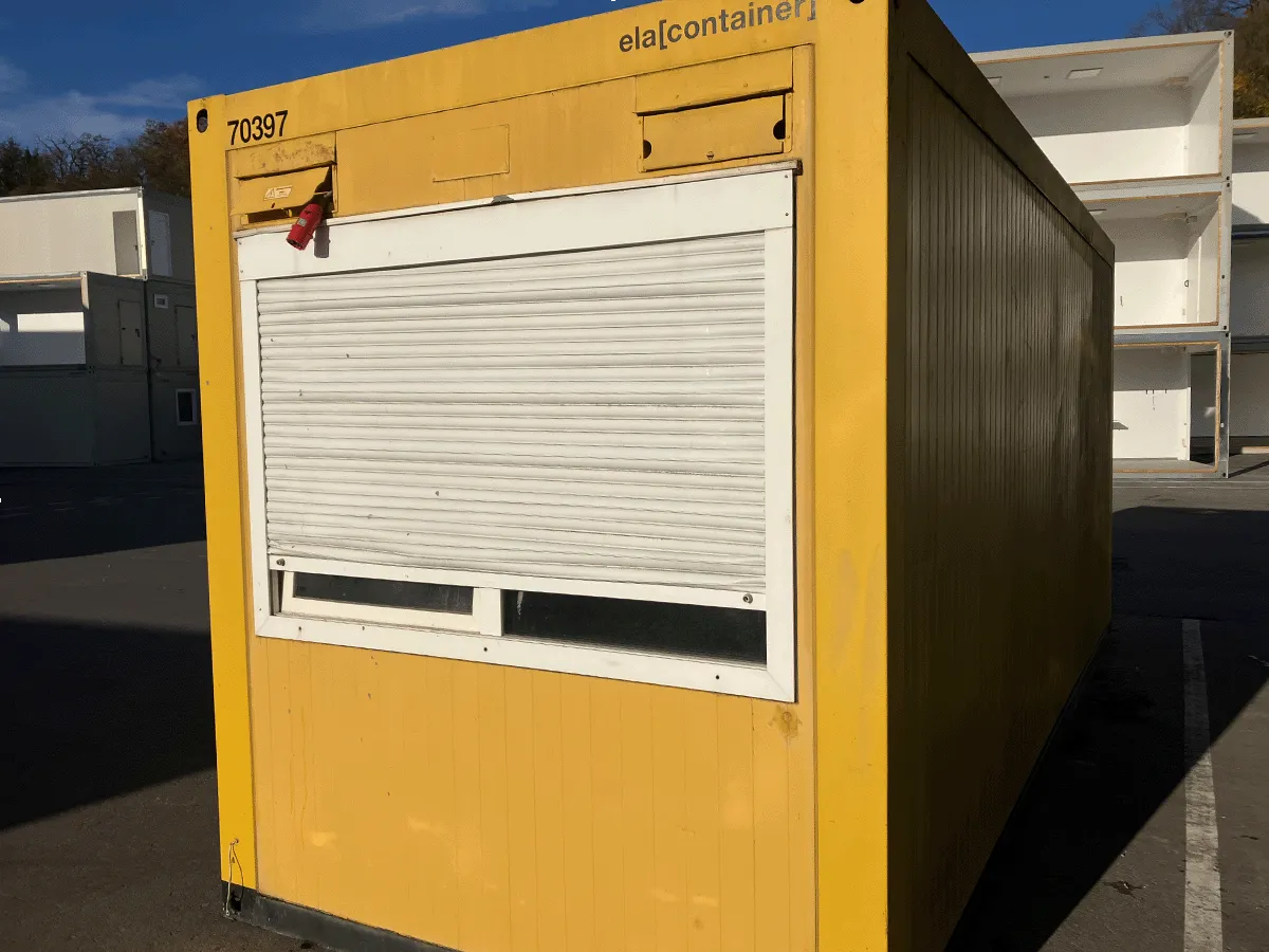 gebrauchter buerocontainer 20 fuss gelb mit fenster und rollladen aussenansicht