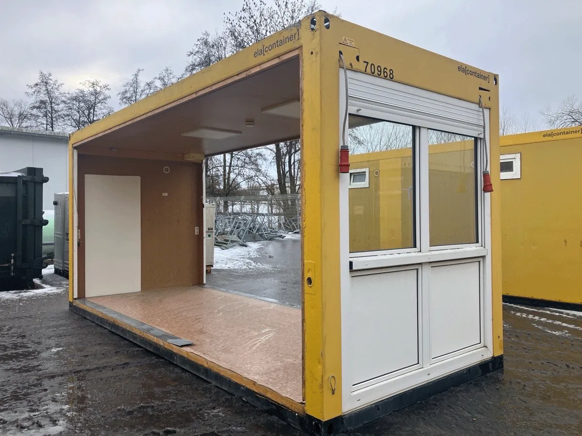 gebrauchter buerocontainer 20 fuss gelb mit offener seite und fensterfront aussenansicht