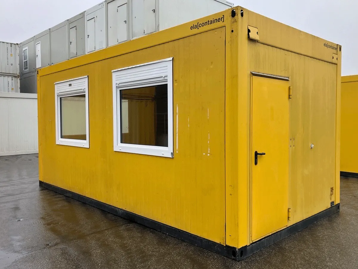 gebrauchter buerocontainer 20 fuss gelb mit fenstern und eingangstuer aussenansicht