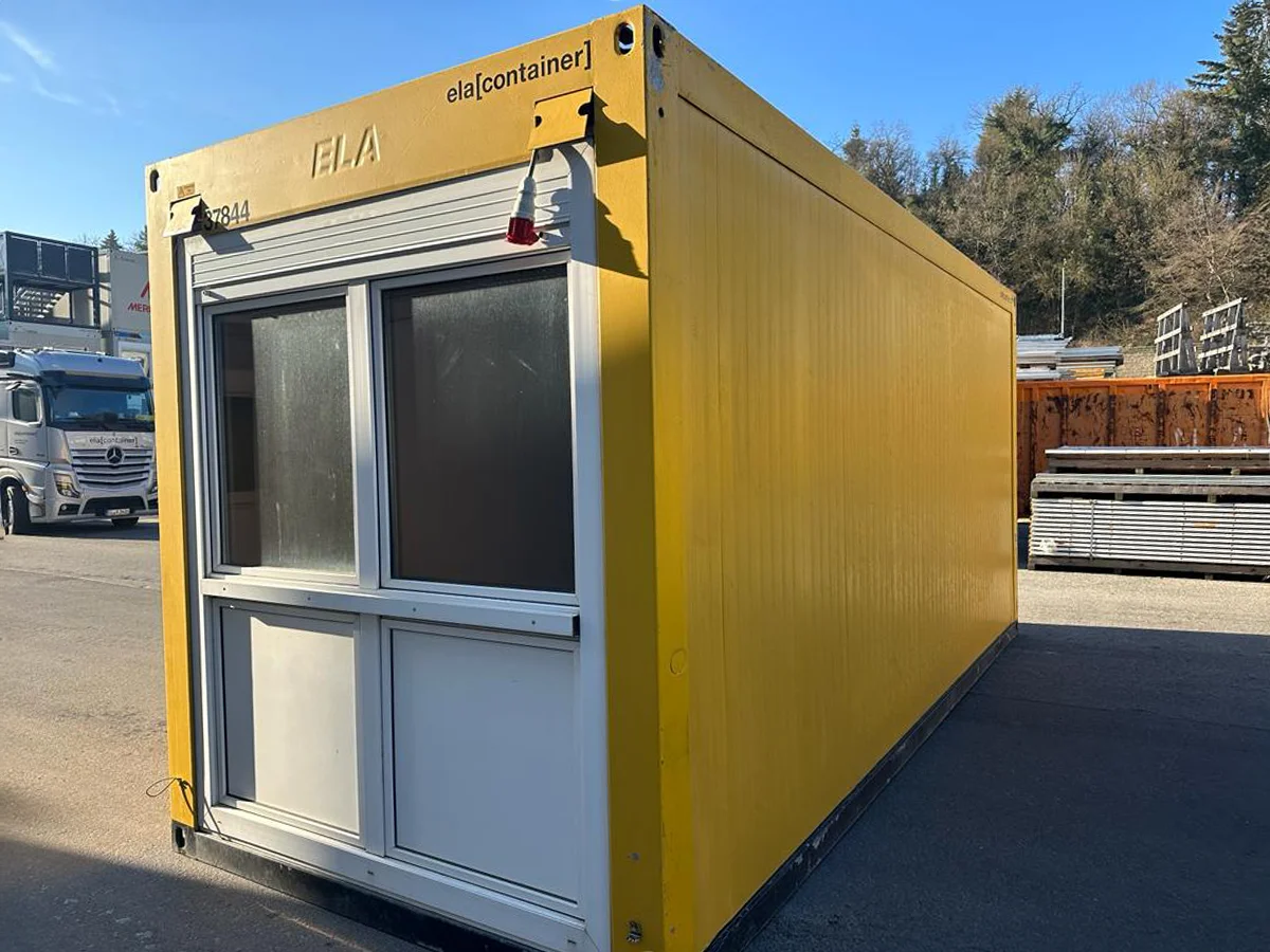 Gebrauchter Bürocontainer ELA Container gelb mit Fensterfront und Außenleuchte