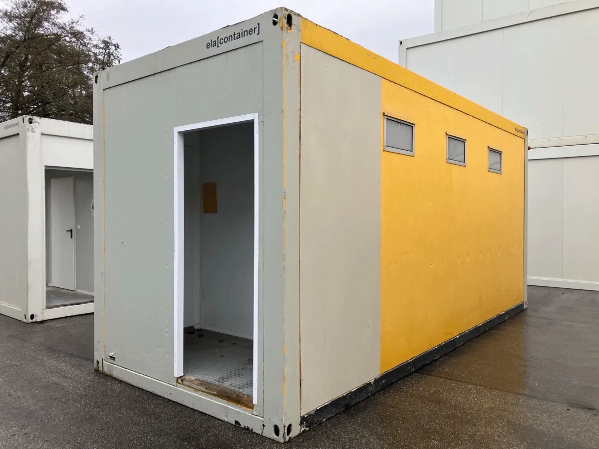 Sanitärcontainer außen grau gelb mit Eingang