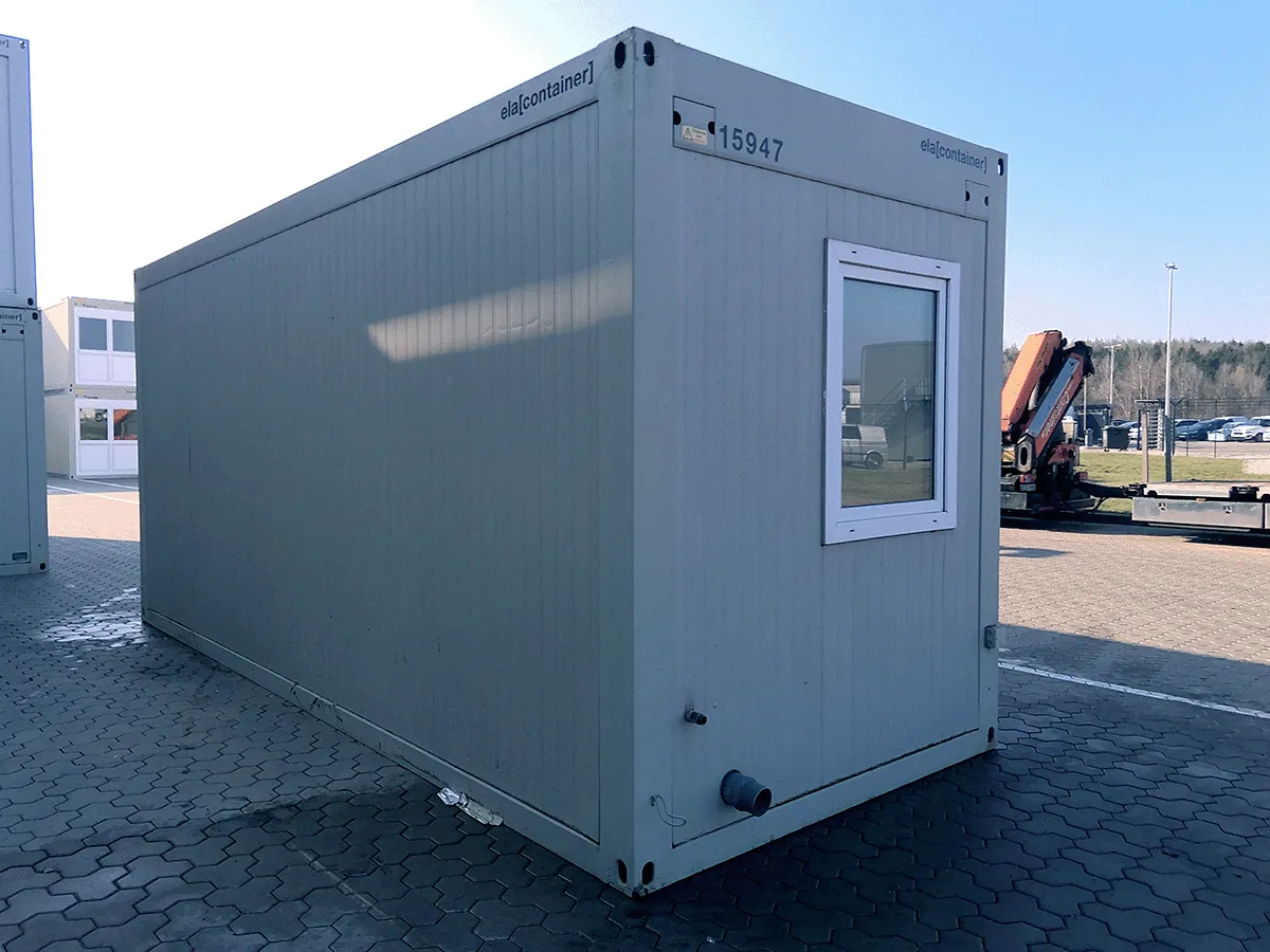Sanitärcontainer außen grau mit Fenster