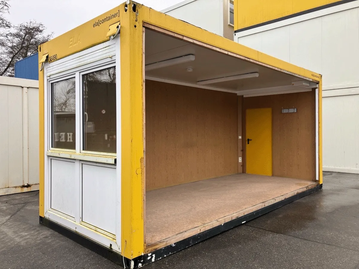Gebrauchter Bürocontainer ELA Container gelb mit Fensterfront und offener Seitenwand