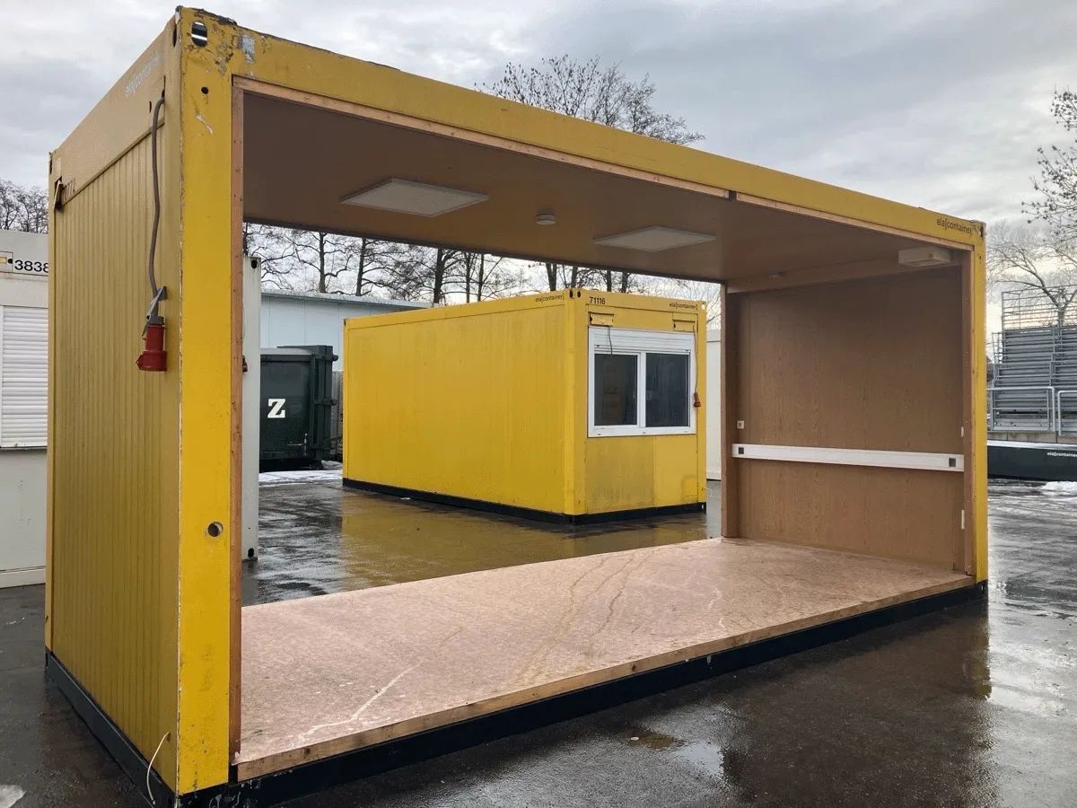 Gebrauchter 20 Fuß Bürocontainer gelb mit großer offener Seitenöffnung und Fenster – Außenansicht schräg von vorne"